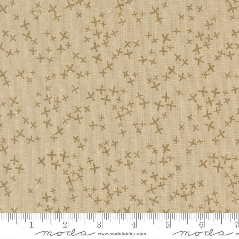 Image of Mira Realm Tan quilting cotton fabric by Zen Chic for Moda Fabrics. Features crosses on a brown background. Cute Little Fabric Shop.