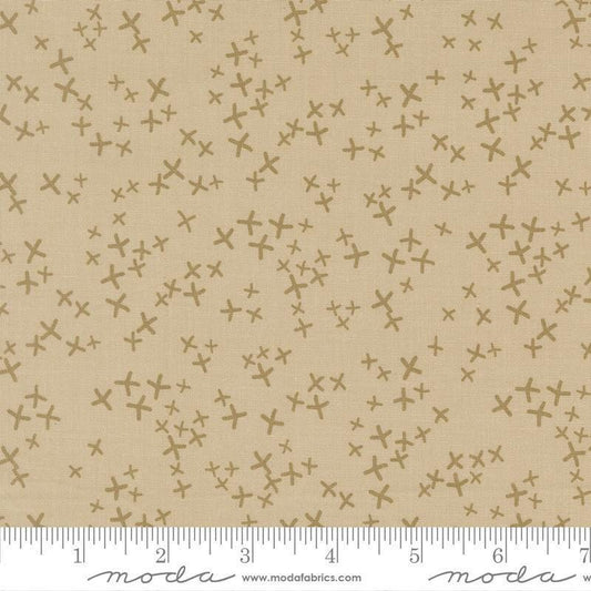 Image of Mira Realm Tan quilting cotton fabric by Zen Chic for Moda Fabrics. Features crosses on a brown background. Cute Little Fabric Shop.