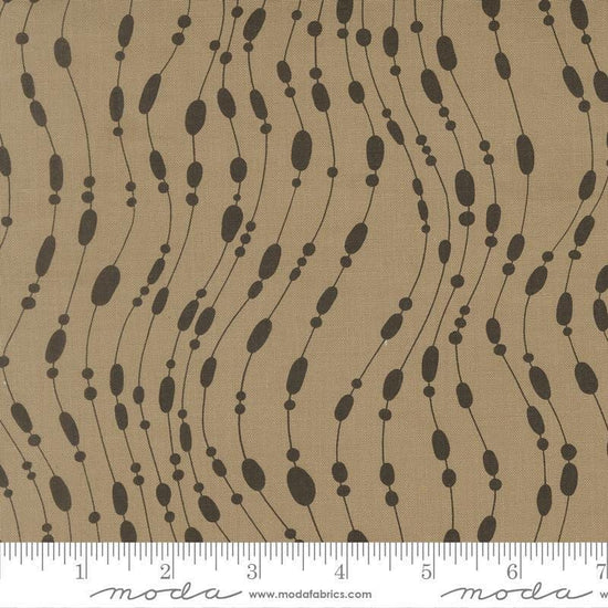 Image of Mira Whisper Taupe quilting cotton fabric by Zen Chic for Moda Fabrics. Features dots on a brown background. Cute Little Fabric Shop.
