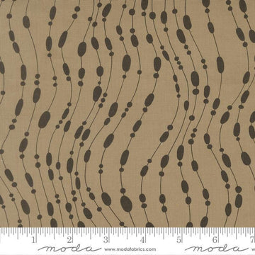 Image of Mira Whisper Taupe quilting cotton fabric by Zen Chic for Moda Fabrics. Features dots on a brown background. Cute Little Fabric Shop.