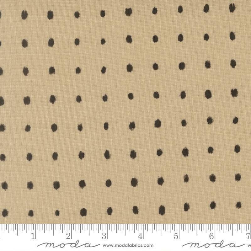 Image of Mira Pure Tan quilting cotton fabric by Zen Chic for Moda Fabrics. Features polka dots on a brown background. Cute Little Fabric Shop.