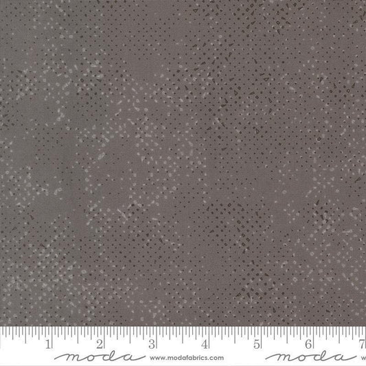 Image of Mira Spotted Graphite quilting cotton fabric by Zen Chic for Moda Fabrics. Features printed texture on a gray background. Cute Little Fabric Shop.