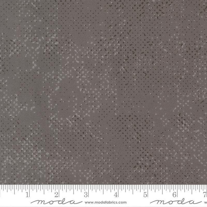 Image of Mira Spotted Graphite quilting cotton fabric by Zen Chic for Moda Fabrics. Features printed texture on a gray background. Cute Little Fabric Shop.