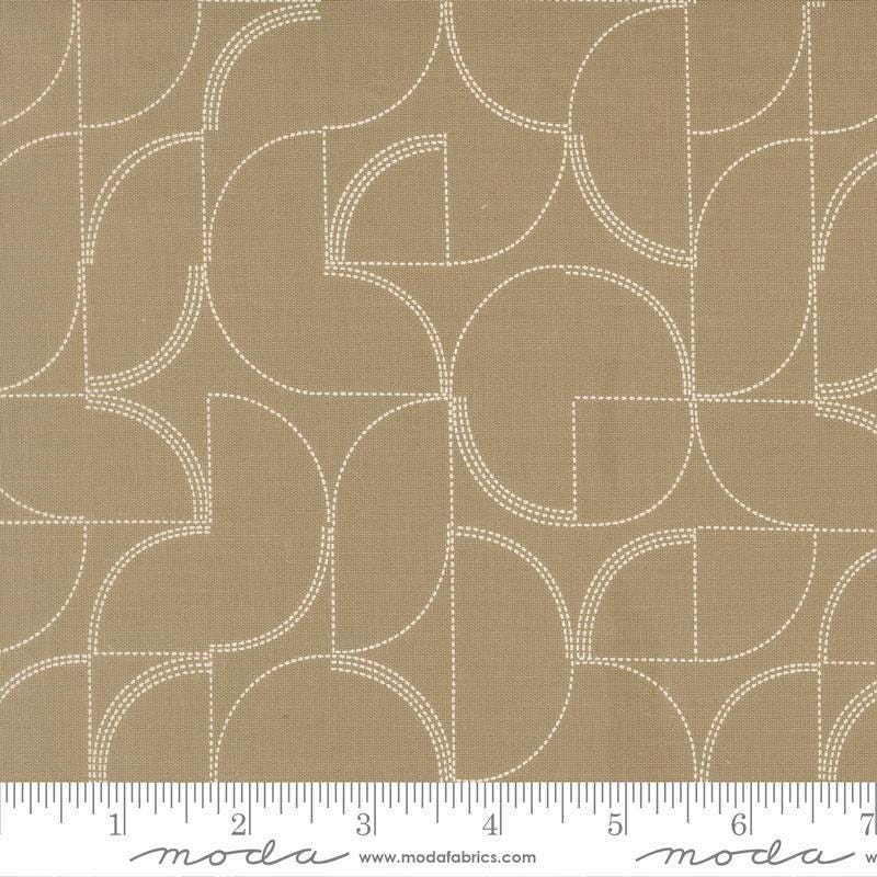 Image of Mira Echo Taupe quilting cotton fabric by Zen Chic for Moda Fabrics. Features a geometric pattern on a brown background. Cute Little Fabric Shop.