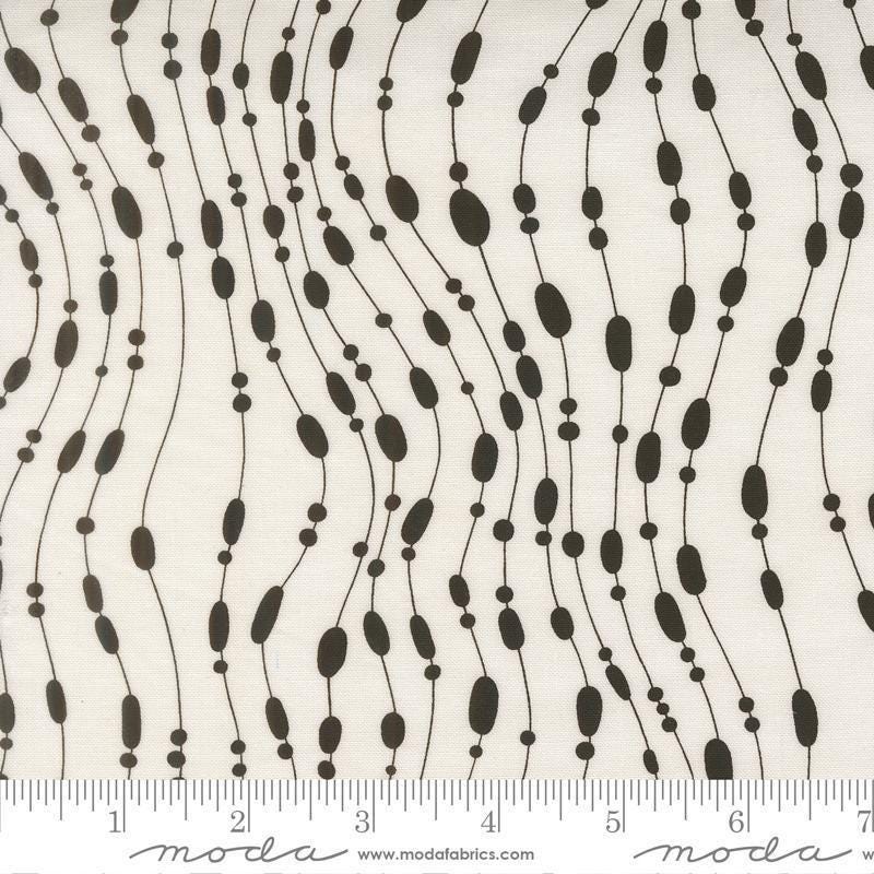 Image of Mira Whisper Pearl quilting cotton fabric by Zen Chic for Moda Fabrics. Features dots on a white background. Cute Little Fabric Shop.