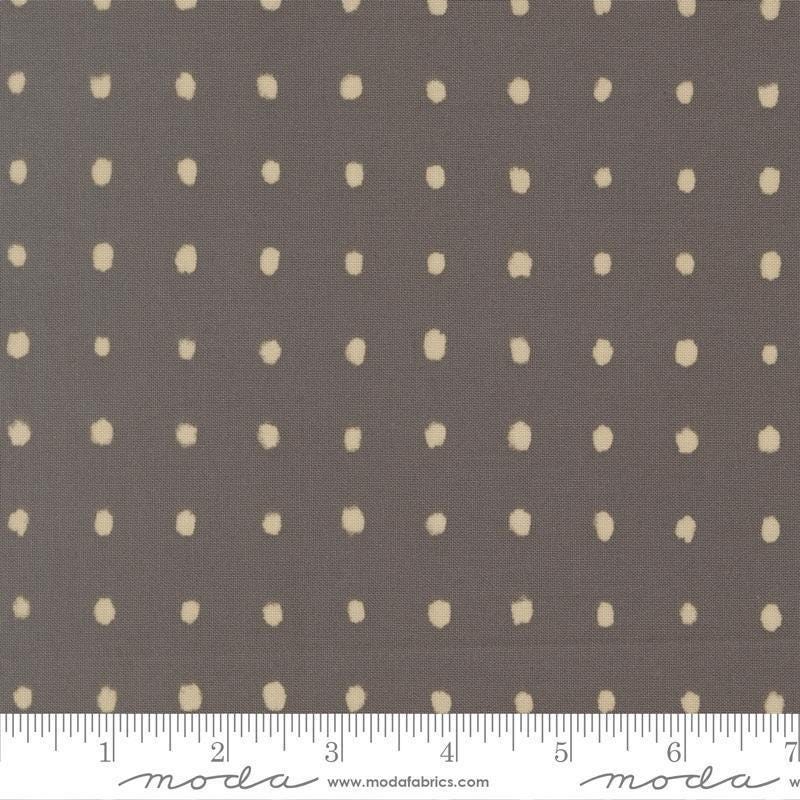 Image of Mira Pure Graphite quilting cotton fabric by Zen Chic for Moda Fabrics. Features polka dots on a gray background. Cute Little Fabric Shop.