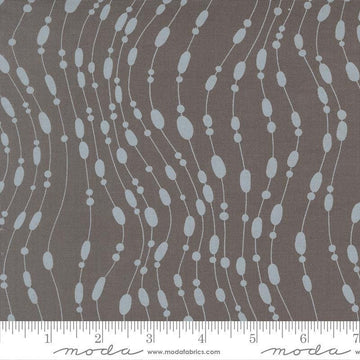Image of Mira Whisper Graphite quilting cotton fabric by Zen Chic for Moda Fabrics. Features dots on a gray background. Cute Little Fabric Shop.