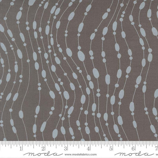 Image of Mira Whisper Graphite quilting cotton fabric by Zen Chic for Moda Fabrics. Features dots on a gray background. Cute Little Fabric Shop.