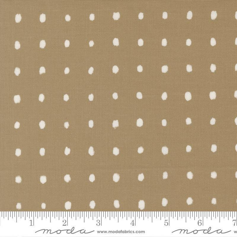 Image of Mira Pure Taupe quilting cotton fabric by Zen Chic for Moda Fabrics. Features polka dots on a brown background. Cute Little Fabric Shop.
