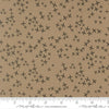 Image of Mira Realm Taupe quilting cotton fabric by Zen Chic for Moda Fabrics. Features crosses on a brown background. Cute Little Fabric Shop.