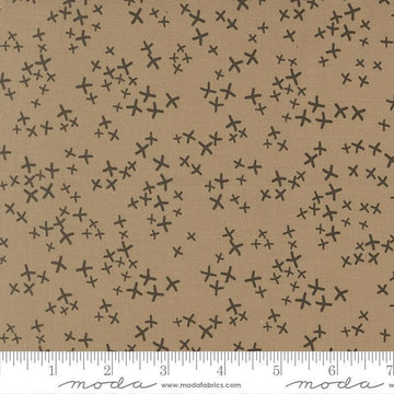 Image of Mira Realm Taupe quilting cotton fabric by Zen Chic for Moda Fabrics. Features crosses on a brown background. Cute Little Fabric Shop.