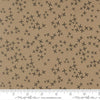 Image of Mira Realm Taupe quilting cotton fabric by Zen Chic for Moda Fabrics. Features crosses on a brown background. Cute Little Fabric Shop.