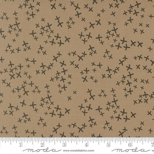 Image of Mira Realm Taupe quilting cotton fabric by Zen Chic for Moda Fabrics. Features crosses on a brown background. Cute Little Fabric Shop.