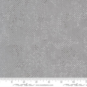 Image of Mira Spotted Light Gray quilting cotton fabric by Zen Chic for Moda Fabrics. Features printed texture on a gray background. Cute Little Fabric Shop.