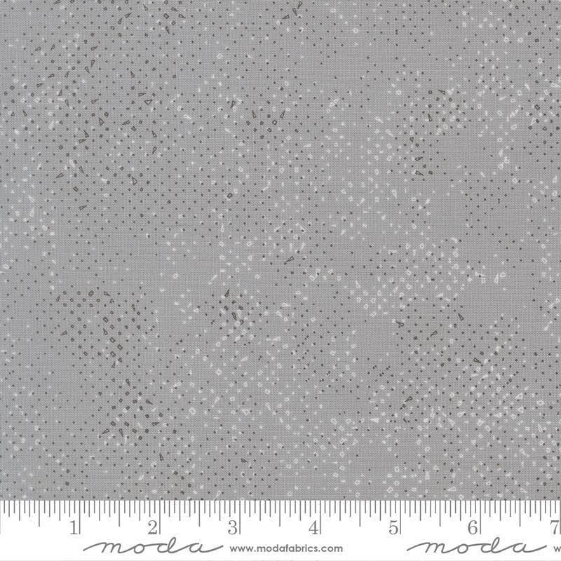 Image of Mira Spotted Light Gray quilting cotton fabric by Zen Chic for Moda Fabrics. Features printed texture on a gray background. Cute Little Fabric Shop.