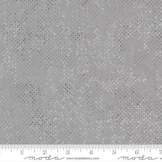 Image of Mira Spotted Light Gray quilting cotton fabric by Zen Chic for Moda Fabrics. Features printed texture on a gray background. Cute Little Fabric Shop.