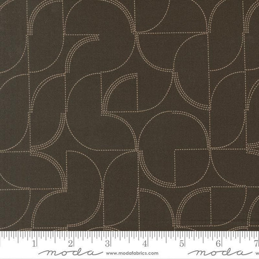 Image of Mira Echo Onyx quilting cotton fabric by Zen Chic for Moda Fabrics. Features a geometric pattern on a brown background. Cute Little Fabric Shop.