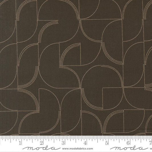 Image of Mira Echo Onyx quilting cotton fabric by Zen Chic for Moda Fabrics. Features a geometric pattern on a brown background. Cute Little Fabric Shop.