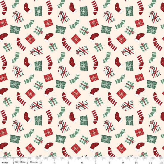 Image of Evergreen Wishes Stockings & Gifts Cream quilting cotton fabric by Traci Reed for Riley Blake Designs. Features presents on a white background. Cute Little Fabric Shop.