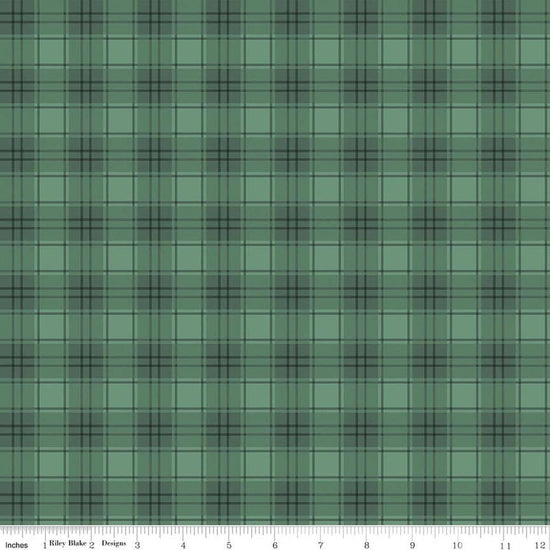 Image of Evergreen Wishes Plaid Green quilting cotton fabric by Traci Reed for Riley Blake Designs. Features plaid on a green background. Cute Little Fabric Shop.