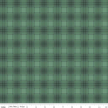 Image of Evergreen Wishes Plaid Green quilting cotton fabric by Traci Reed for Riley Blake Designs. Features plaid on a green background. Cute Little Fabric Shop.