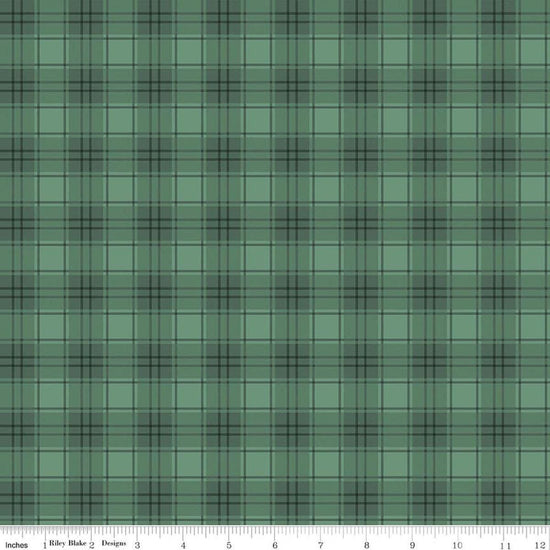 Image of Evergreen Wishes Plaid Green quilting cotton fabric by Traci Reed for Riley Blake Designs. Features plaid on a green background. Cute Little Fabric Shop.