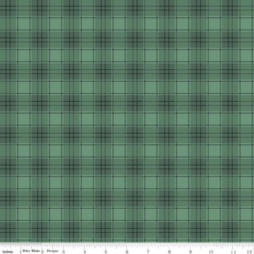 Image of Evergreen Wishes Plaid Green quilting cotton fabric by Traci Reed for Riley Blake Designs. Features plaid on a green background. Cute Little Fabric Shop.