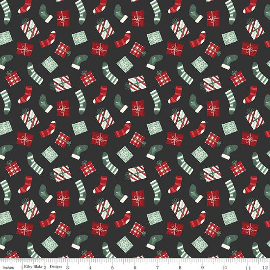 Image of Evergreen Wishes Stockings & Gifts Black quilting cotton fabric by Traci Reed for Riley Blake Designs. Features presents on a black background. Cute Little Fabric Shop.