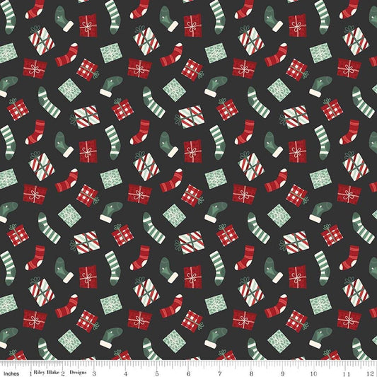 Image of Evergreen Wishes Stockings & Gifts Black quilting cotton fabric by Traci Reed for Riley Blake Designs. Features presents on a black background. Cute Little Fabric Shop.