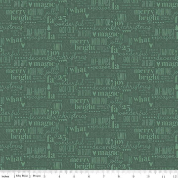 Image of Evergreen Wishes Text Green quilting cotton fabric by Traci Reed for Riley Blake Designs. Features words on a green background. Cute Little Fabric Shop.