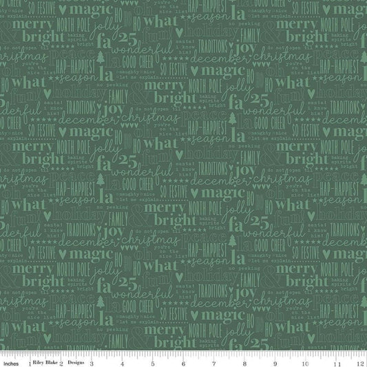 Image of Evergreen Wishes Text Green quilting cotton fabric by Traci Reed for Riley Blake Designs. Features words on a green background. Cute Little Fabric Shop.
