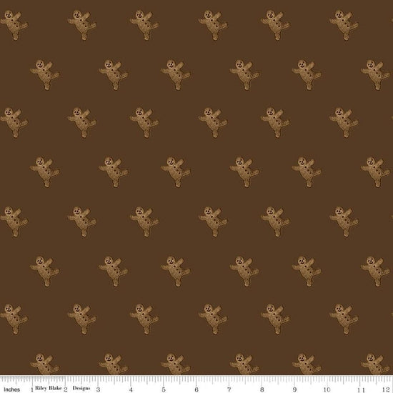 Image of Gingerbread Gingerbread Toss Brown quilting cotton fabric by J. Wecker Frisch for Riley Blake Designs. Features gingerbread men on a brown background. Cute Little Fabric Shop.
