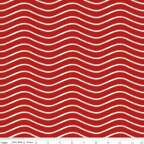 Image of Gingerbread Icing Stripe Red quilting cotton fabric by J. Wecker Frisch for Riley Blake Designs. Features wavy stripes on a red background. Cute Little Fabric Shop.