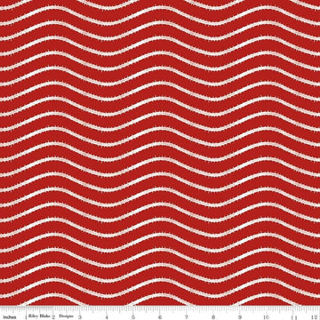 Image of Gingerbread Icing Stripe Red quilting cotton fabric by J. Wecker Frisch for Riley Blake Designs. Features wavy stripes on a red background. Cute Little Fabric Shop.