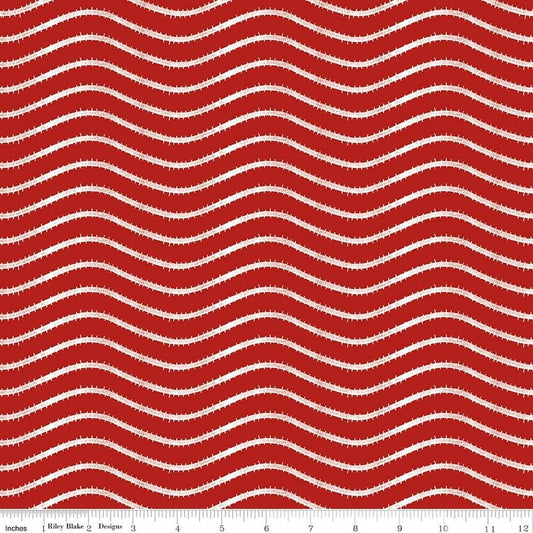 Image of Gingerbread Icing Stripe Red quilting cotton fabric by J. Wecker Frisch for Riley Blake Designs. Features wavy stripes on a red background. Cute Little Fabric Shop.