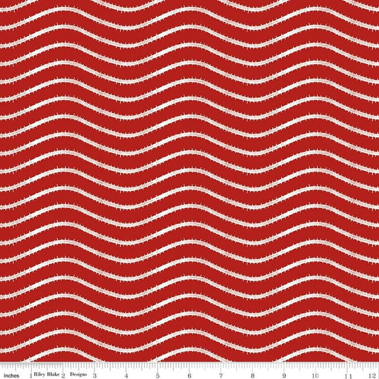 Image of Gingerbread Icing Stripe Red quilting cotton fabric by J. Wecker Frisch for Riley Blake Designs. Features wavy stripes on a red background. Cute Little Fabric Shop.