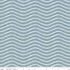 Image of Gingerbread Icing Stripes Blue quilting cotton fabric by J. Wecker Frisch for Riley Blake Designs. Features wavy stripes on a blue background. Cute Little Fabric Shop.