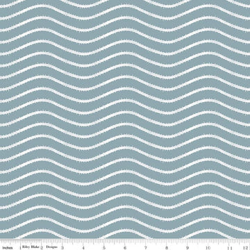 Image of Gingerbread Icing Stripes Blue quilting cotton fabric by J. Wecker Frisch for Riley Blake Designs. Features wavy stripes on a blue background. Cute Little Fabric Shop.