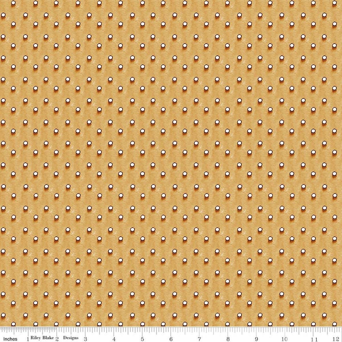 Image of Gingerbread Royal Icing Dots Gingersnap quilting cotton fabric by J. Wecker Frisch for Riley Blake Designs. Features dots on a brown background. Cute Little Fabric Shop.