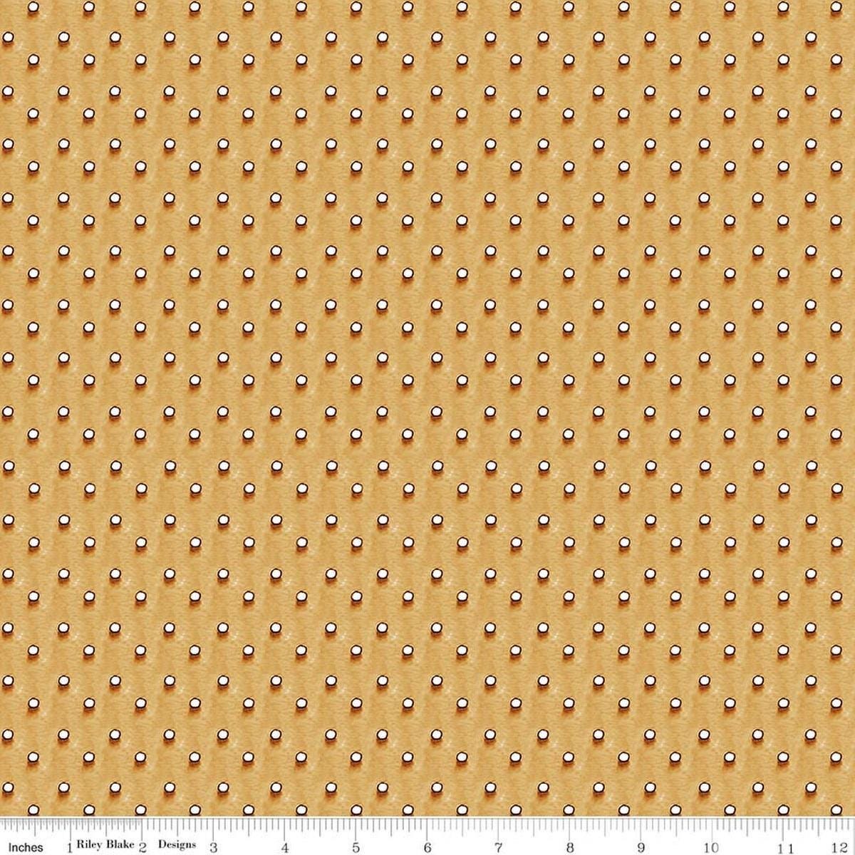 Image of Gingerbread Royal Icing Dots Gingersnap quilting cotton fabric by J. Wecker Frisch for Riley Blake Designs. Features dots on a brown background. Cute Little Fabric Shop.
