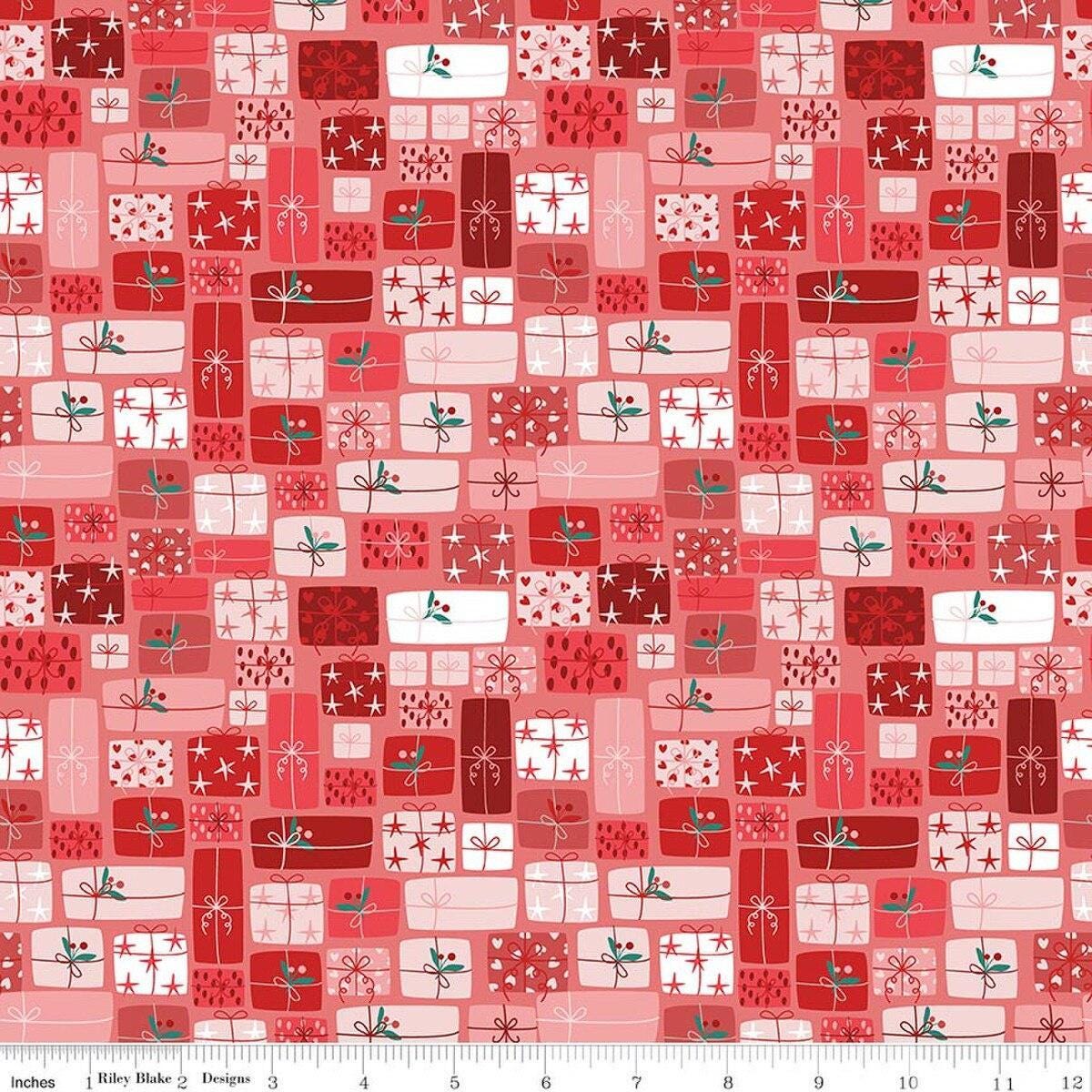 Image of Nutcracker Tradition Gifts of Giving Berry quilting cotton fabric by Jennifer Long for Riley Blake Designs. Features presents on a red background. Cute Little Fabric Shop.