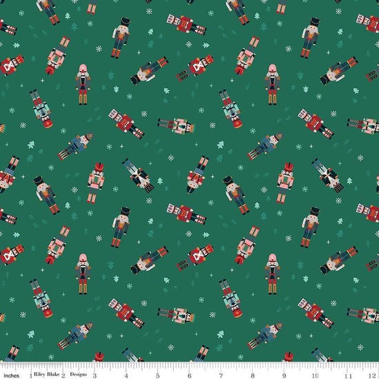 Image of Nutcracker Tradition Nutcracker Toss quilting cotton fabric by Jennifer Long for Riley Blake Designs. Features nutcrackers on a green background. Cute Little Fabric Shop.
