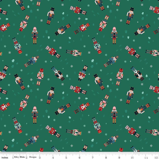 Image of Nutcracker Tradition Nutcracker Toss quilting cotton fabric by Jennifer Long for Riley Blake Designs. Features nutcrackers on a green background. Cute Little Fabric Shop.