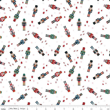 Image of Nutcracker Tradition Nutcracker Toss Snow quilting cotton fabric by Jennifer Long for Riley Blake Designs. Features nutcrackers on a white background. Cute Little Fabric Shop.