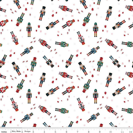 Image of Nutcracker Tradition Nutcracker Toss Snow quilting cotton fabric by Jennifer Long for Riley Blake Designs. Features nutcrackers on a white background. Cute Little Fabric Shop.