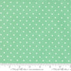 Image of A Cat Named Stitch Cosmo Green quilting cotton fabric by Camille Roskelley for Riley Blake Designs. Features polka dot squares on a green background. Cute Little Fabric Shop.