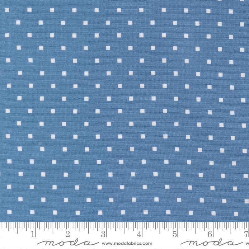 Image of A Cat Named Stitch Cosmo Blue quilting cotton fabric by Camille Roskelley for Riley Blake Designs. Features polka dot square on a blue background. Cute Little Fabric Shop.