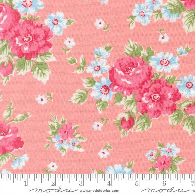 Image of A Cat Named Stitch Blooming Florals Blush quilting cotton fabric by Camille Roskelley for Riley Blake Designs. Features flowers on a pink background. Cute Little Fabric Shop.