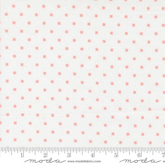 Image of A Cat Named Stitch Cosmo Cream Blush quilting cotton fabric by Camille Roskelley for Riley Blake Designs. Features polka dot square on a cream background. Cute Little Fabric Shop.