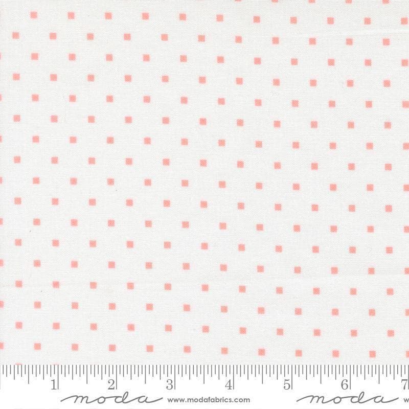 Image of A Cat Named Stitch Cosmo Cream Blush quilting cotton fabric by Camille Roskelley for Riley Blake Designs. Features polka dot square on a cream background. Cute Little Fabric Shop.